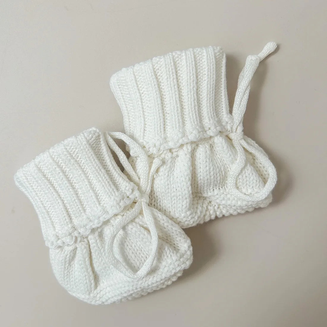 Petite + Co Cuff Newborn Lace Booties Milk