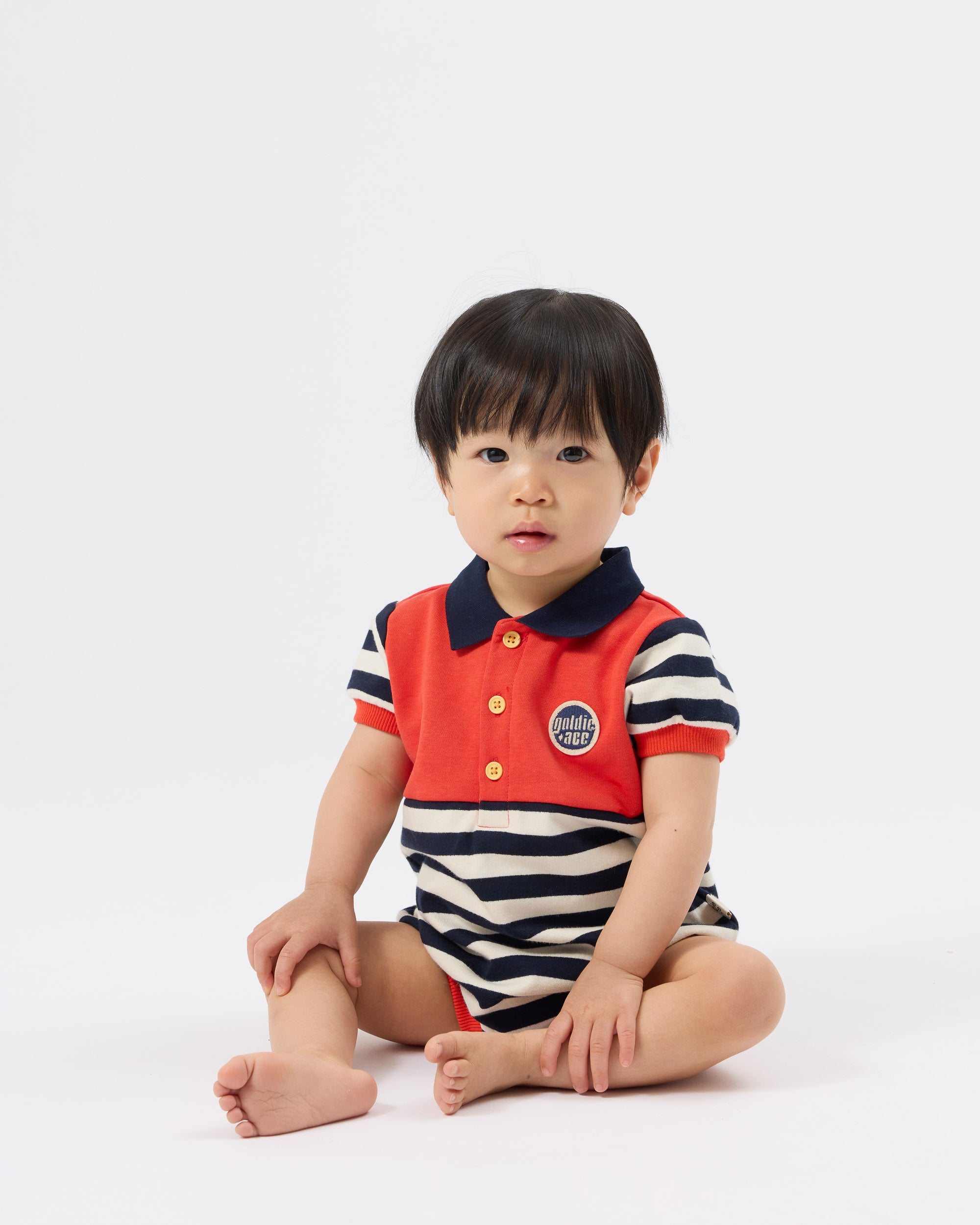 GOLDIE & ACE PANELLED STRIPE POLO ROMPER
