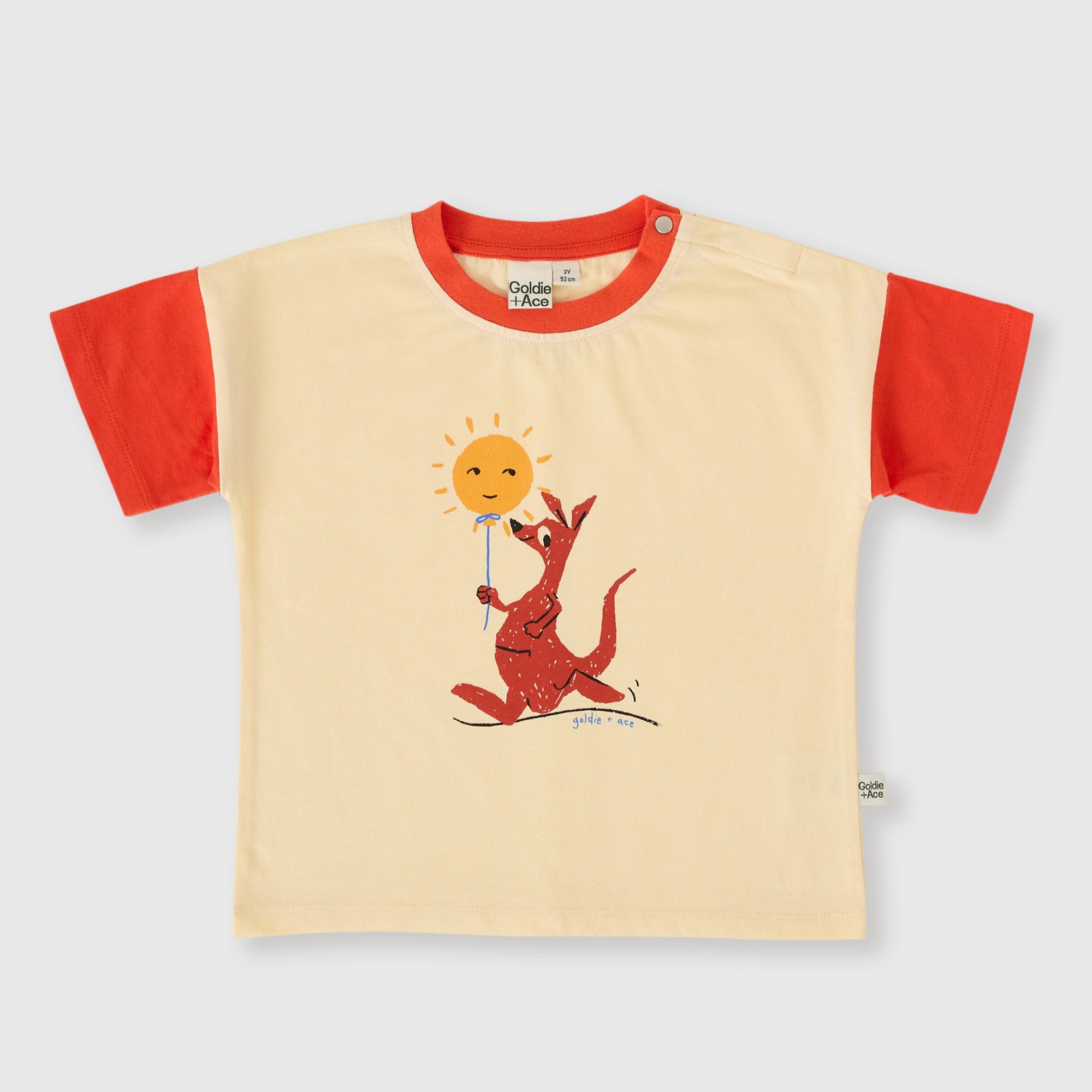 Children's t-shirt with red HAND DRAWN KANGAROO design on a beige background