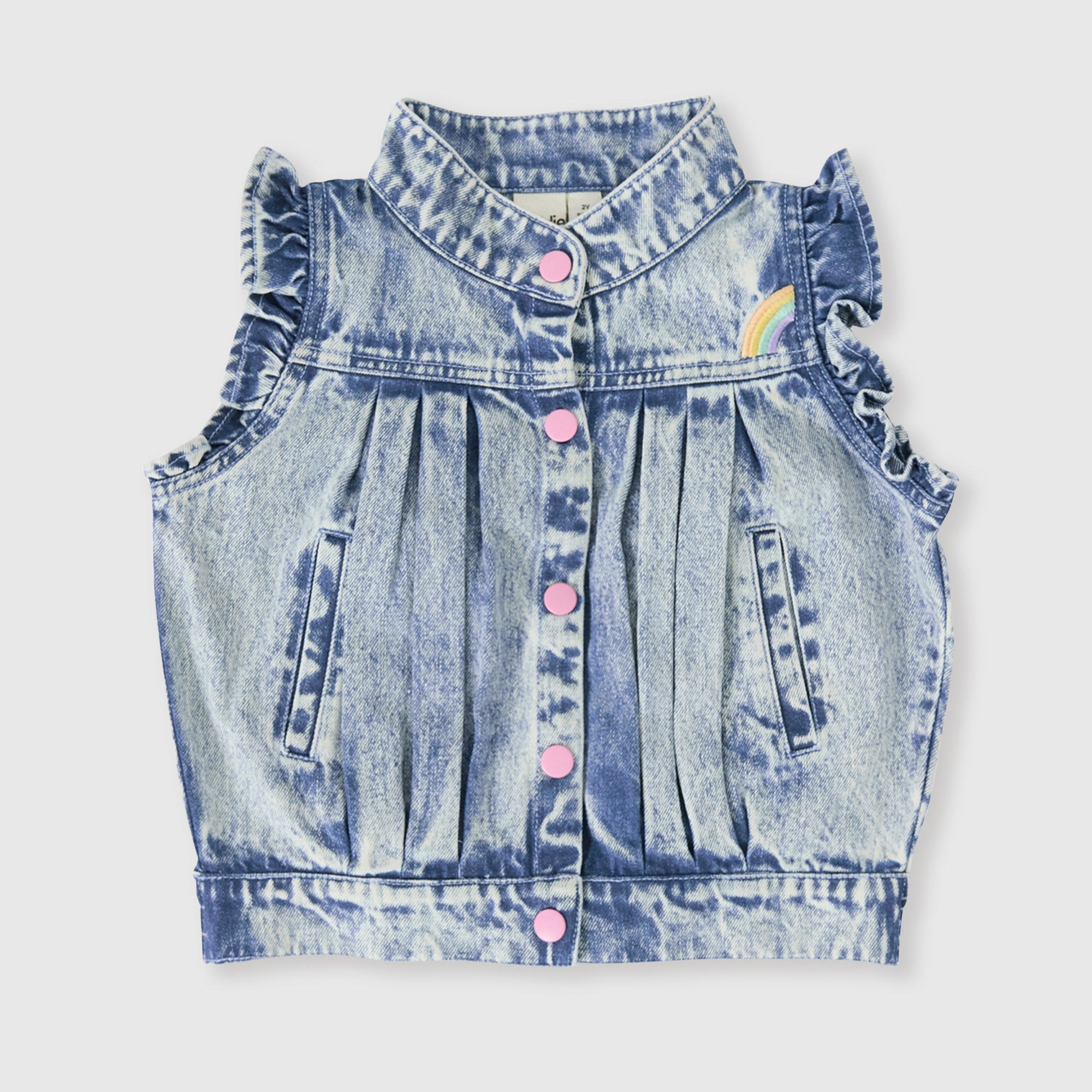 Denim vest with ruffled sleeves and pink buttons on a light gray background